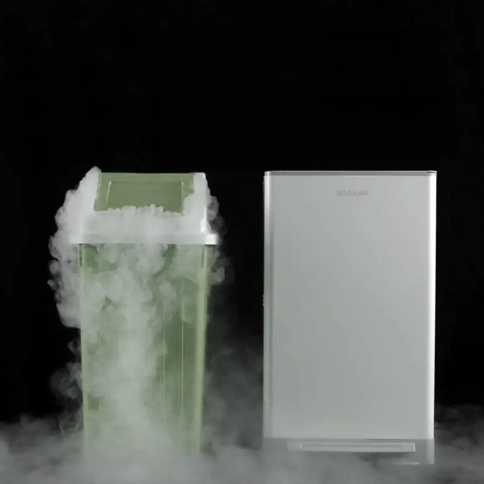 Smoke-like odor bursting from an open diaper pail beside a double-sealed Janibell pail